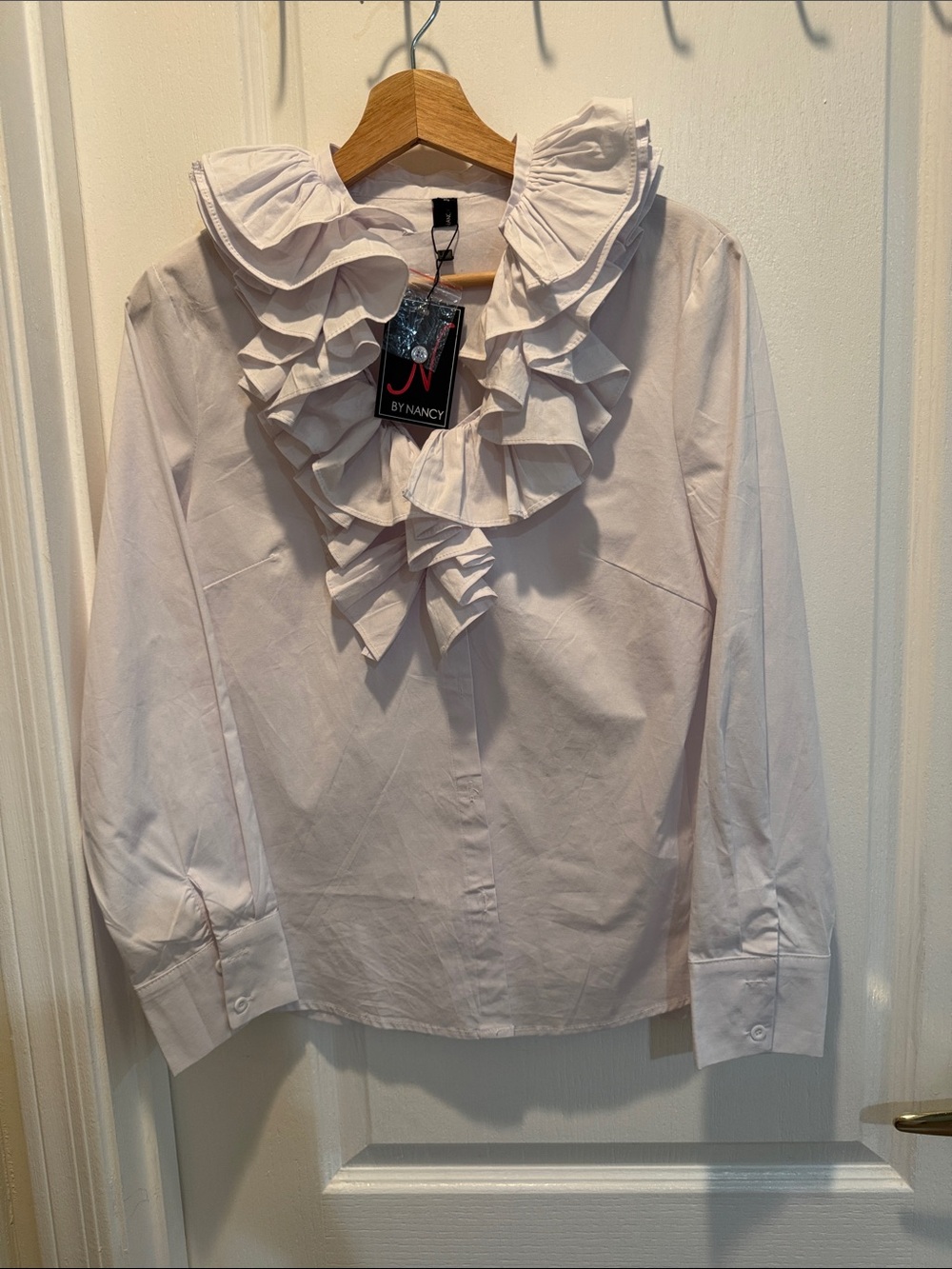 Woman’s Ruffled Collar Long-Sleeve Top - White